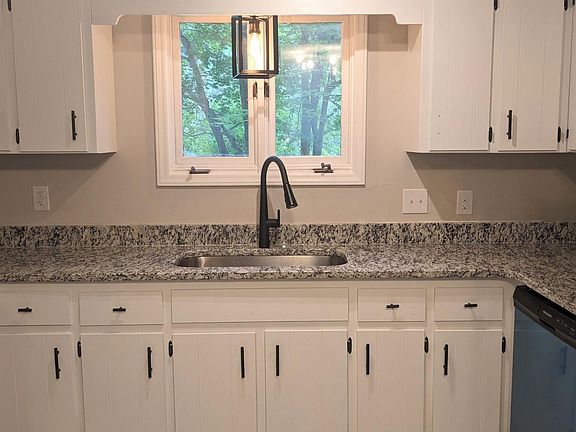 All new granite and stainless steel appliances