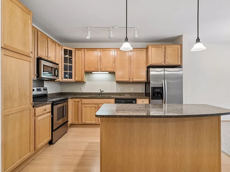 LIKE NEW CABINETS AND HARDWOOD FLOORS