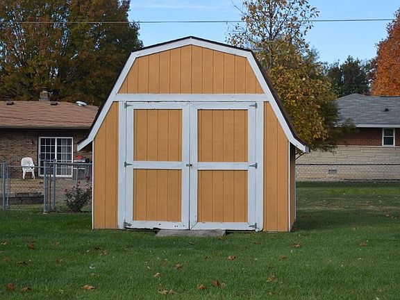 Storage barn out back. Good place for yard toys & tools.