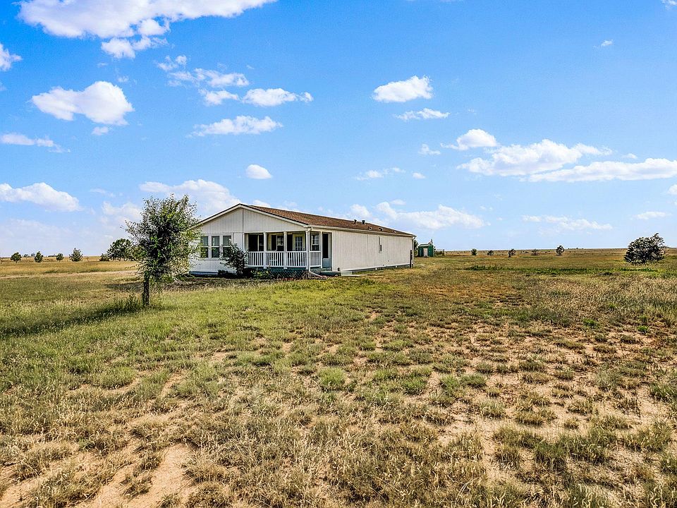 Beautiful house surrounded by stunning views of the prairie.