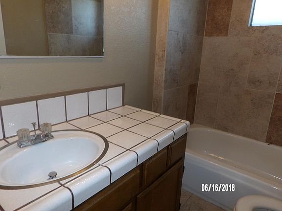 ONE OF THREE FULL BATHROOMS.
