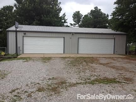 30 x 50 "Man" Shop
						:
						Concrete floor, openers on both overhead doors, security system