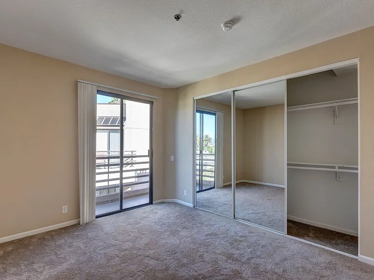 Chelsea Court One Bedroom with Mirrored Sliding Closet Doors