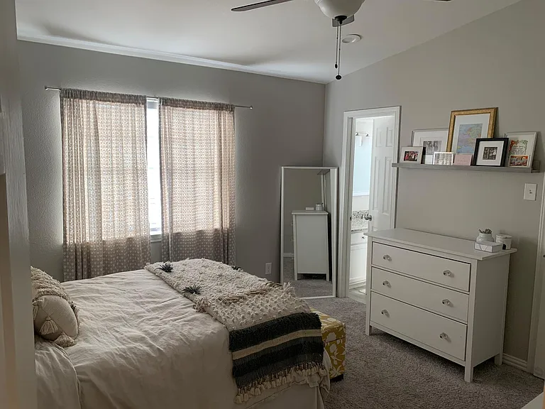 large, bright 2nd bedroom upstairs with huge walk in closet and full bathroom with lots of natural light - great as an additional bedroom for roommates, or an office!