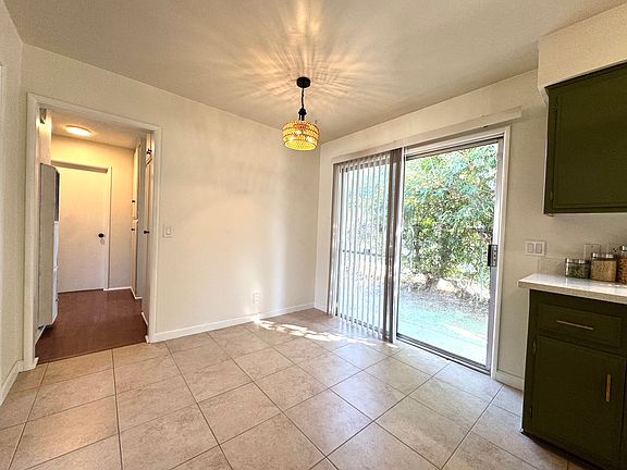 Dining area with slider to back yard.