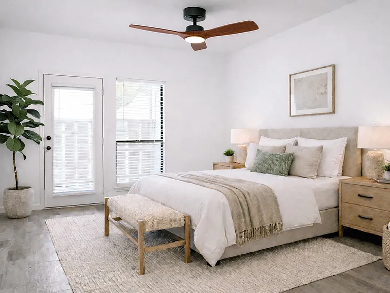 Primary Bedroom with Walk-in Closet and Private Patio *Virtually Staged*