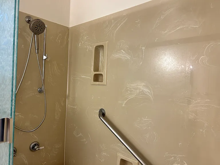 Shower with grab bars