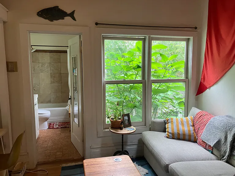 Looking toward bathroom with spiral stairs just to your right out of view