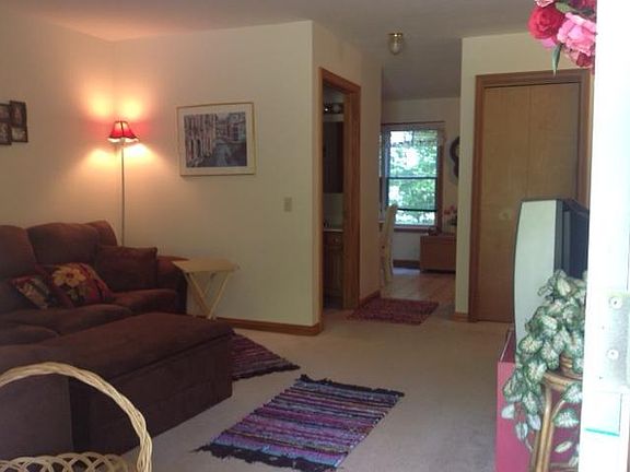 Hall to 1/2 bath, dining , & kitchen