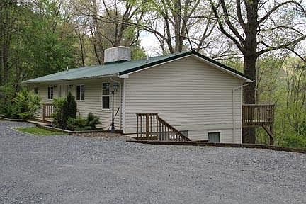 Exterior with spacious, level parking