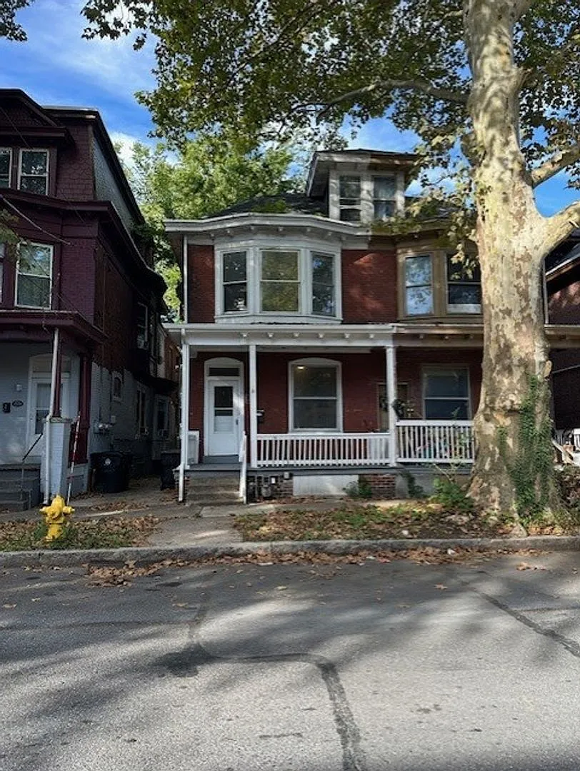 Spacious 4-Bedroom, 1.5-Bathroom Row Home For Rent in Harrisburg, PA, located within the Harrisbu... — Photo 1
