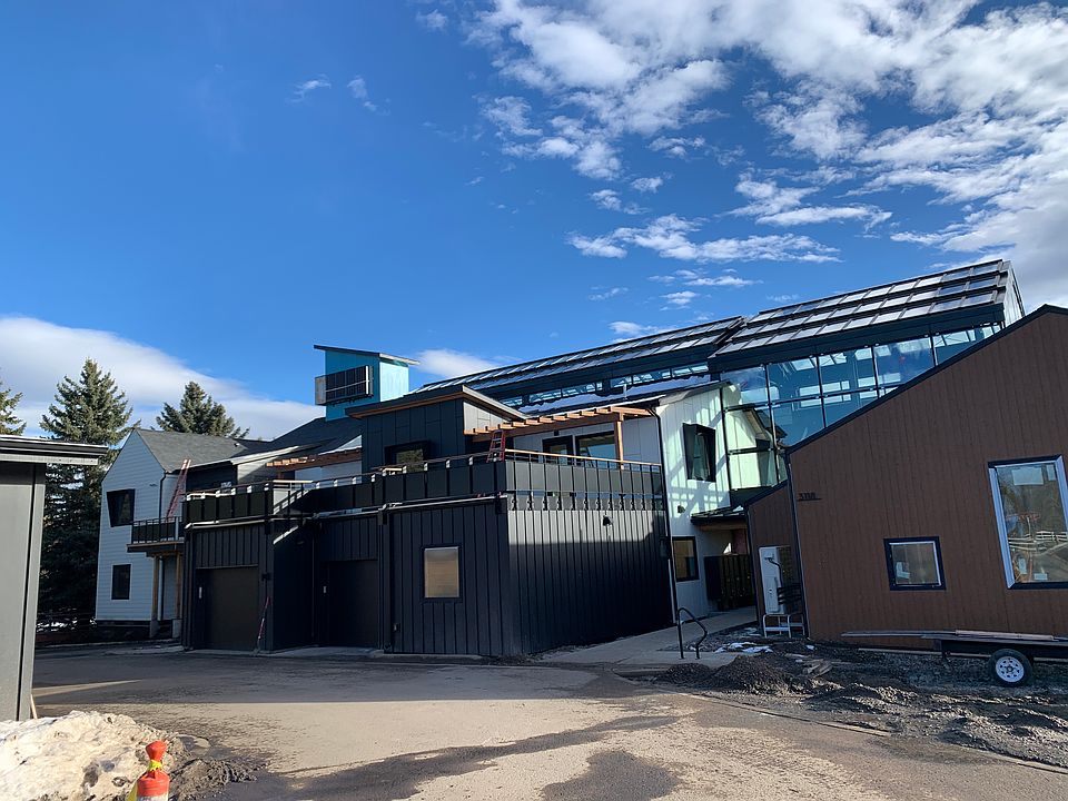 my unit is in this brand new building, the Atrium -- NE corner of the building, ground floor -- some landscaping will not be completed till spring