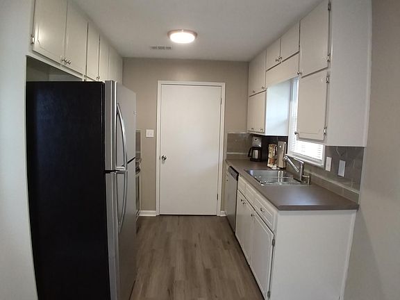 Door to utility/laundry room