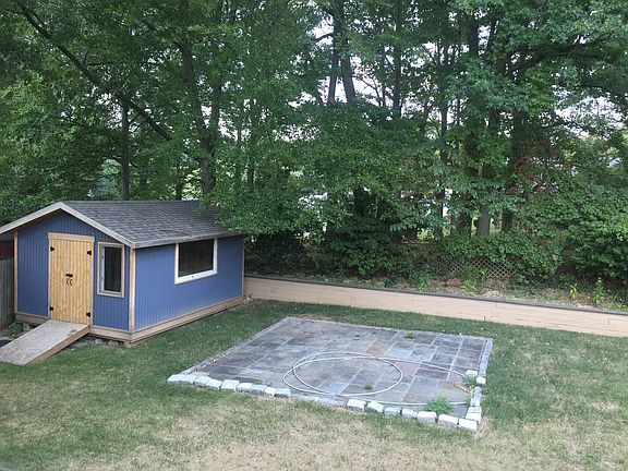 Back yard with Custom Shed