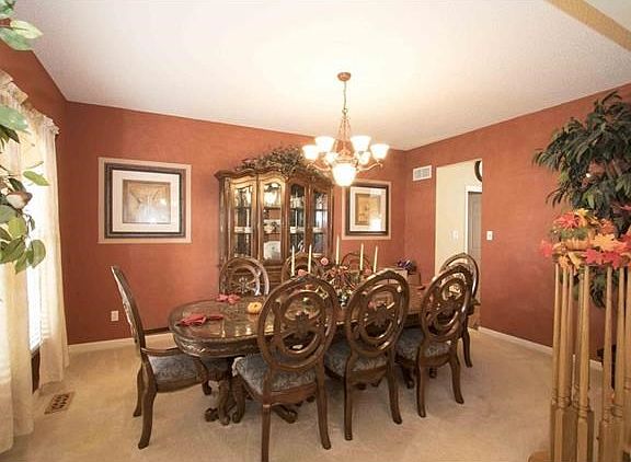 Memories are made here with beautiful lighting and tasteful wall paint....