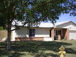 Charming, well maintained home is located on a large corner lot