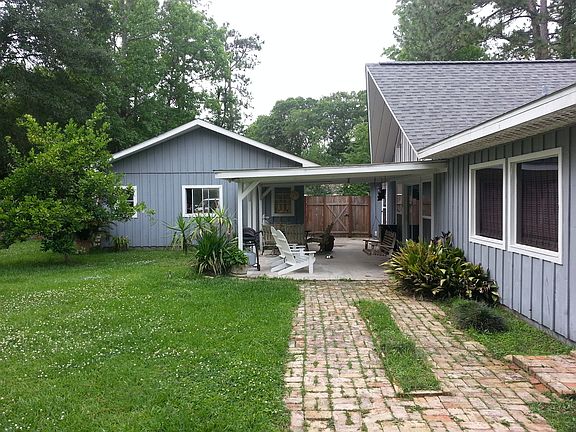 Back view with covered patio