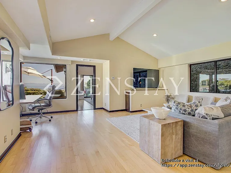 Dedicated home office with abundant natural light.