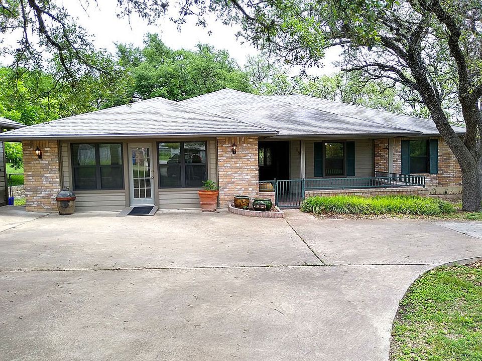 Front view of house w/porch.