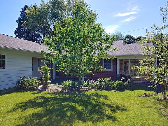 Back of house and garage side. Looking towards patio