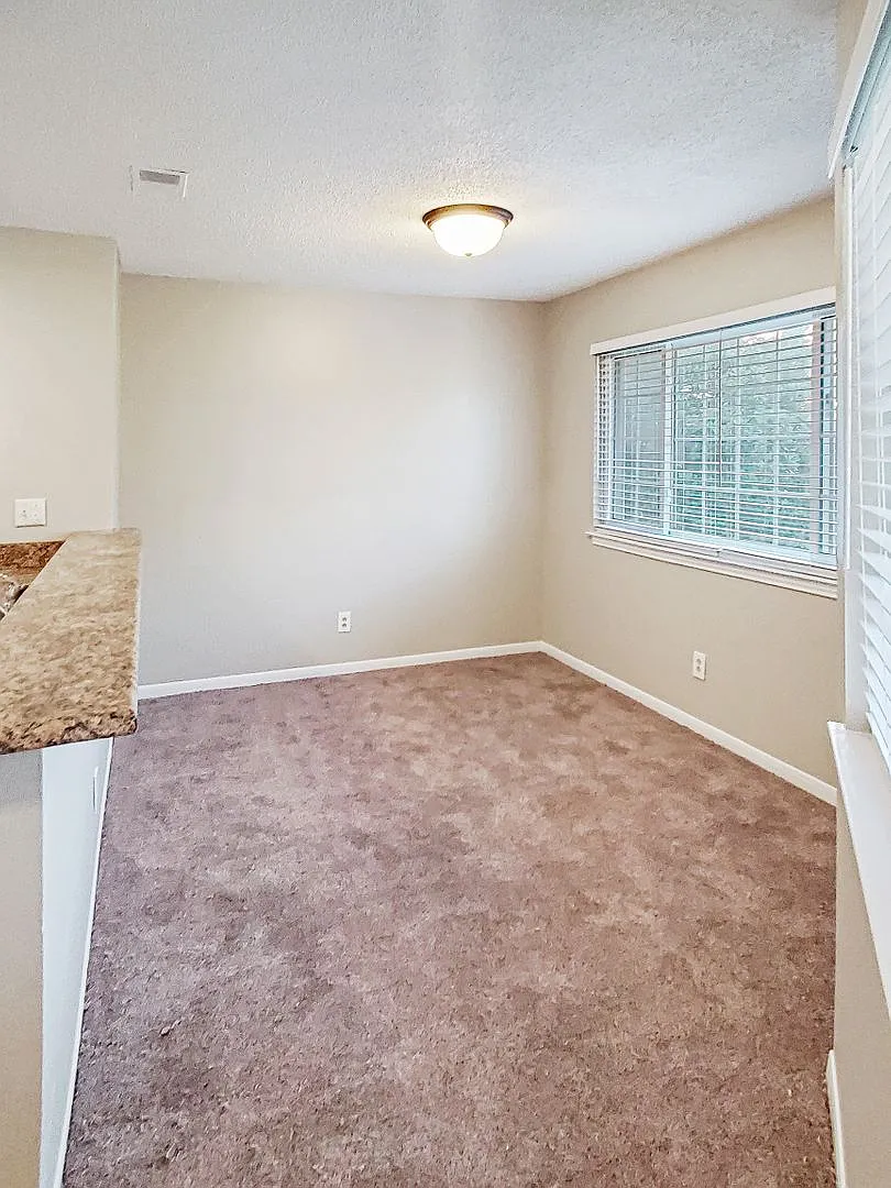 Charming 2BR/2BA Townhouse-Style Condo Near MidCity — Photo 2