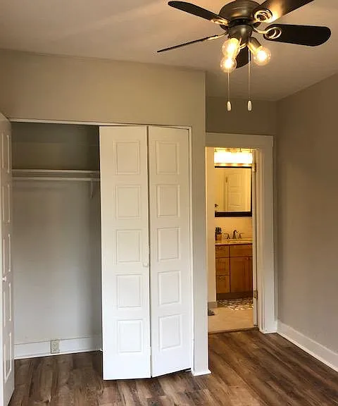 Bedroom faces the backyard, has wood laminate flooring, ceiling fan, large closet and is ensuite to the bathroom.