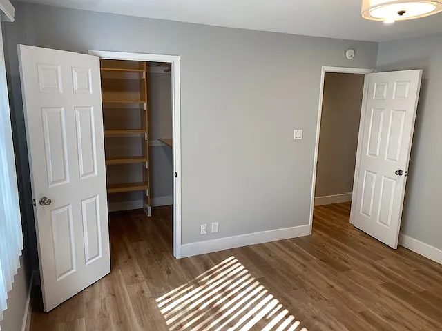 Big Bedroom with walk-in Closet 
all new doors and hardware.
Notice all new beautiful paint, with base molding