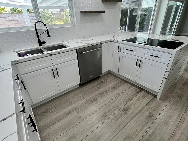 Newly remodeled kitchen with new cabinets and granite countertops