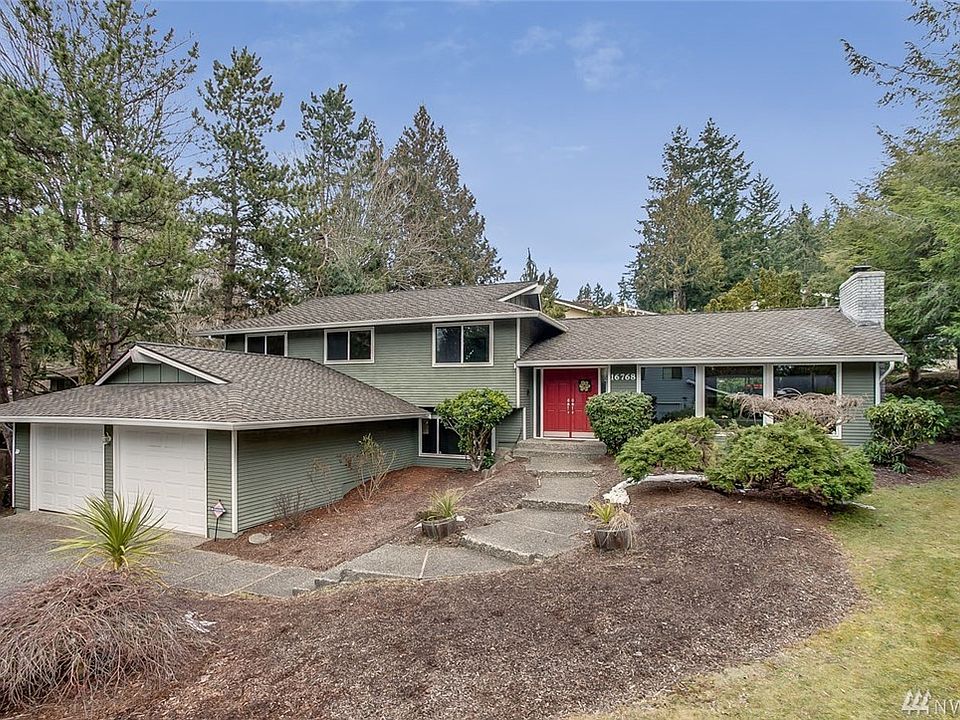 Welcome Home to Fairwood Greens! This welcoming 4 bedroom, 3 bath, tri-level home is located at the entrance of a quiet cul-de-sac. Made for gatherings, you'll love the spacious living and dining rooms with soaring vaulted ceilings and huge windows. The eat-in kitchen has black appliances and a nice pantry for extra storage. Through a large slider, extend your living space outside to the entertainment sized patio and secluded backyard. On the upper floor, the spacious master suite features two closets and ensuite 3/4 bath, along with three additional guestrooms and a full bath. On the lower level you'll find room for everyone in the large family room and even larger bonus room with wet bar! Feel at ease because this home has been updated with lots of big-ticket items: Freshly painted, new furnace, newer water heater, presidential roof, gutters, garage doors, vinyl windows, washer & dryer! 