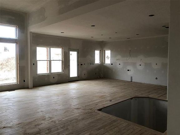 ACTUAL PICTURE 1.31.21 - UNDER CONSTRUCTION - DINING KITCHEN AREA BEFORE ISLAND, CABINETRY - OPEN