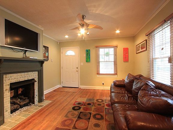 The focal point of the living room is the dramatic fireplace.