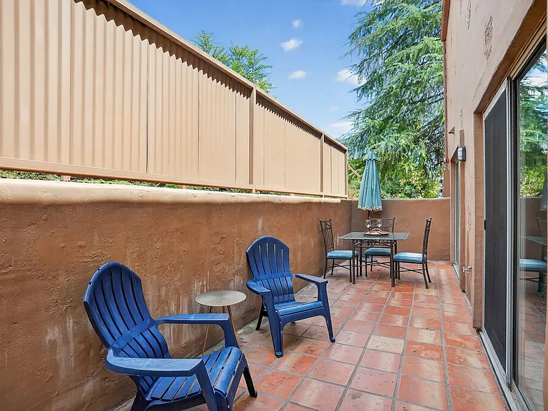 backyard outdoor patio, with access from the living room and the master bedroom with sliding glass doors