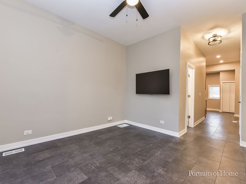Main level living room toward kitchen