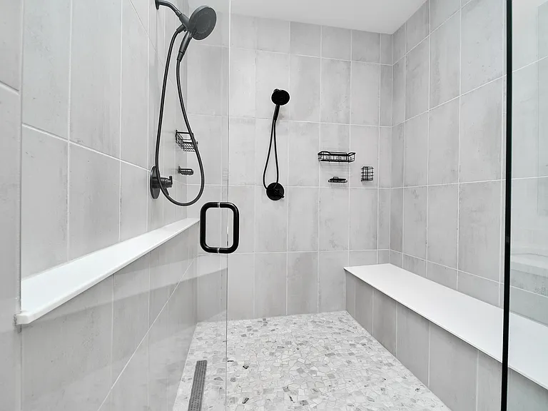 Large walk in shower with two shower heads