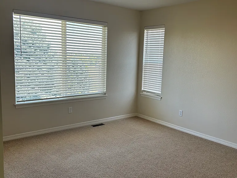 Master bedroom with peek a boo view of open space