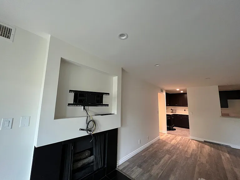 Gas fireplace. Mount for flat screen TV provided.