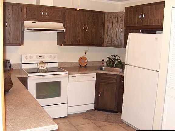 Kitchen has new countertops, floor, dishwasher & stove. Includes Refrigerator.