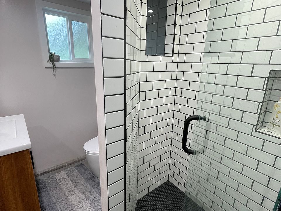 Custom build in shower window for more natural lighting