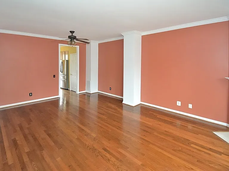 Open living/dinning rooms featuring hardwood floors