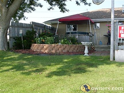 pond/flower garden/hot tub area