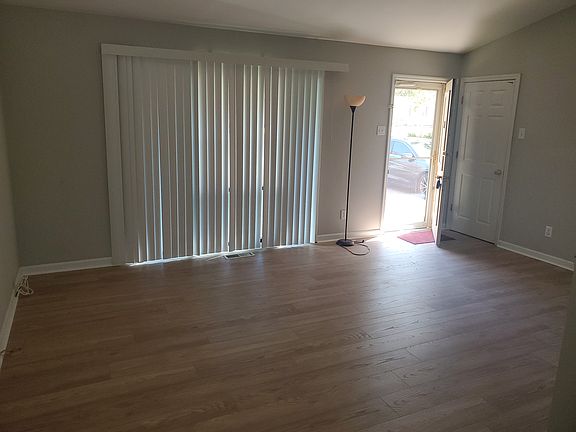 Main level living room with new LVT flooring.