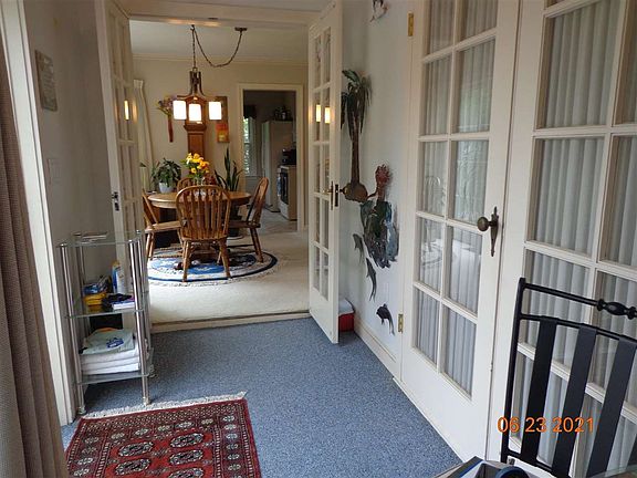 French doors to living room from back entry