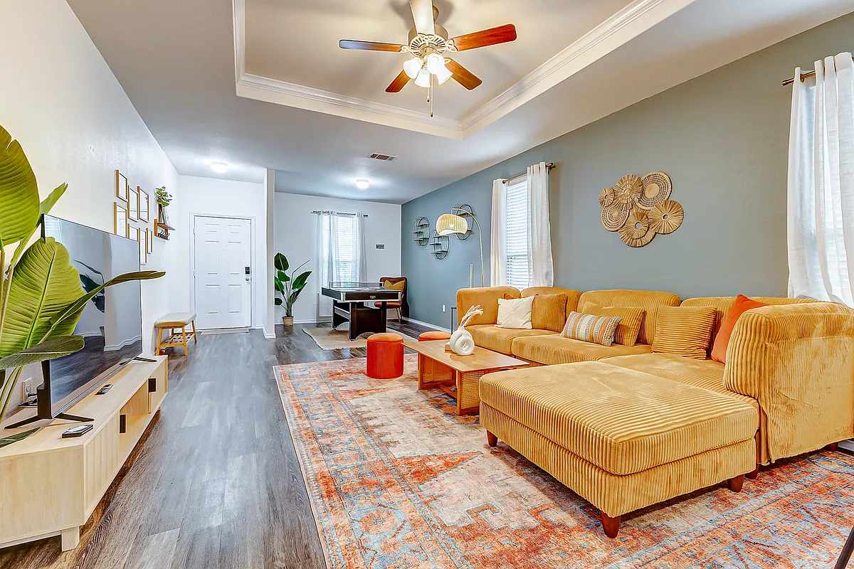 Photo 1 of 34 - 24035 Noble Darcy Ln - Katy, TX Spacious Living Room- With 65 inch TV - 24035 Noble Darcy Ln