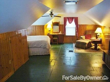 Upstairs Bedroom
						:
						Dormer; attic storage along both sides; pine wainscotting.
