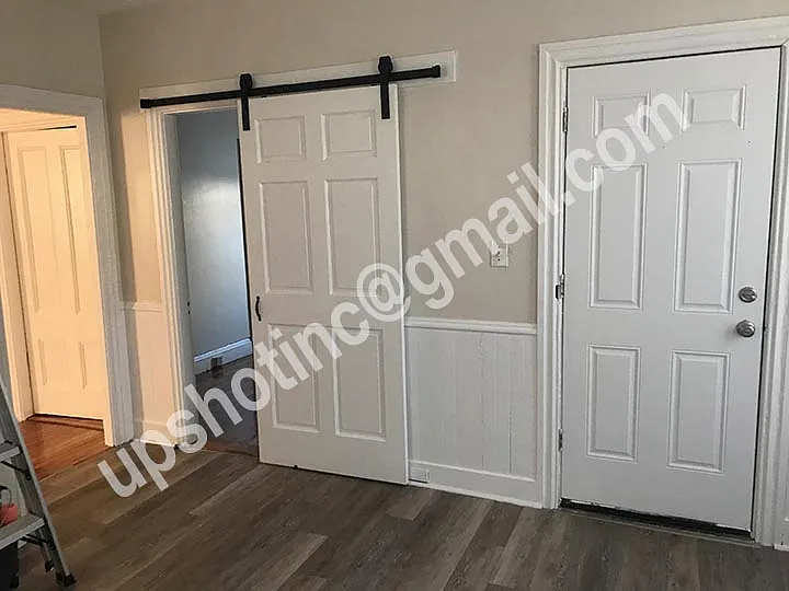 Barn Door in Kitchen to one bedroom.