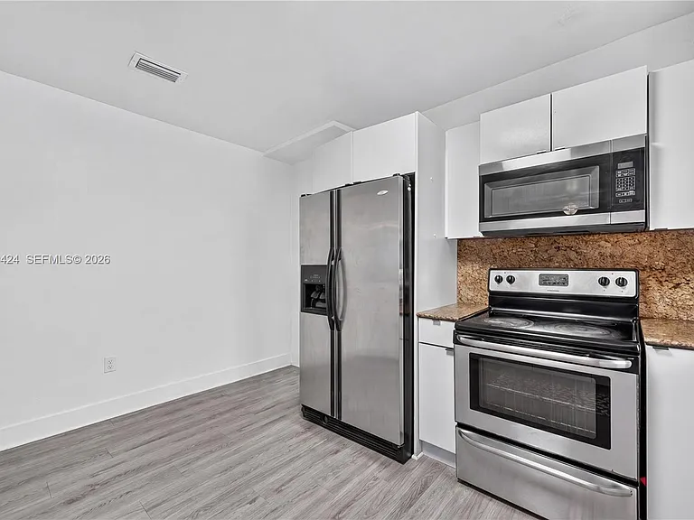 1169 NW 30th St — Photo 19