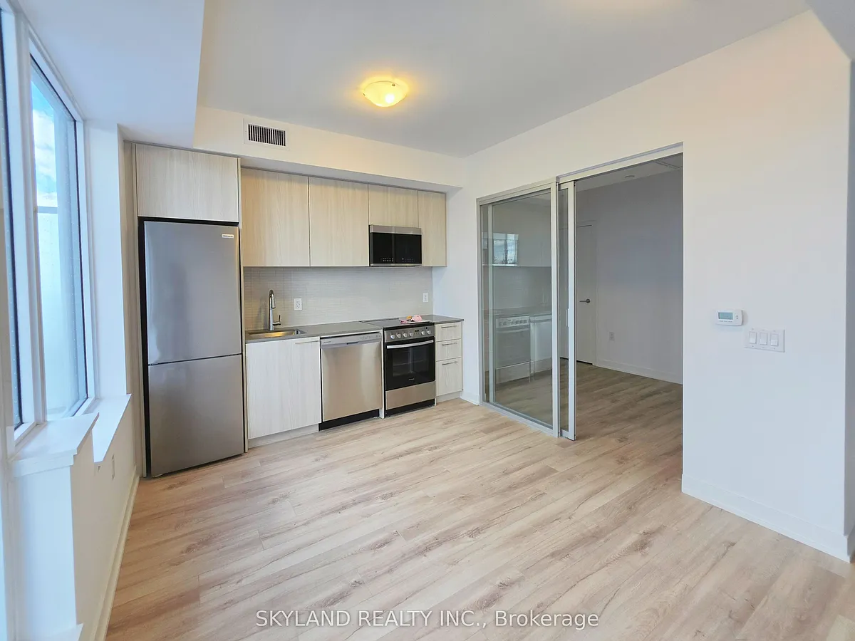 Building Photo - 7437 Kingston Rd #409B