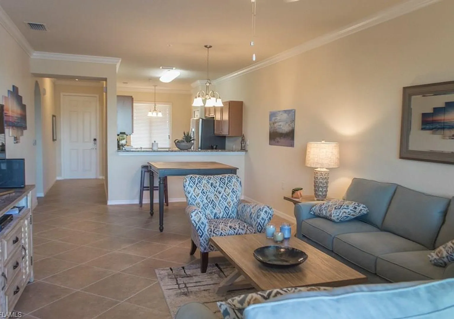 New Top Floor Condo in the Resort Style Community of Treviso Bay — Photo 1