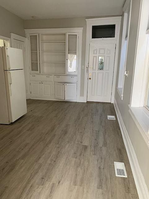 Kitchen from living room. Ample cabinet space and room for a table!