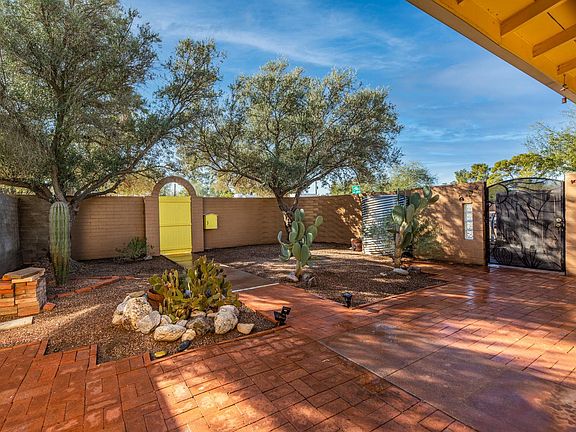 Shaded front courtyard with 500 gallon rain barrel